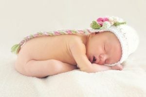 baby in sleeping pose