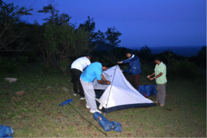 team pitching up their own tents